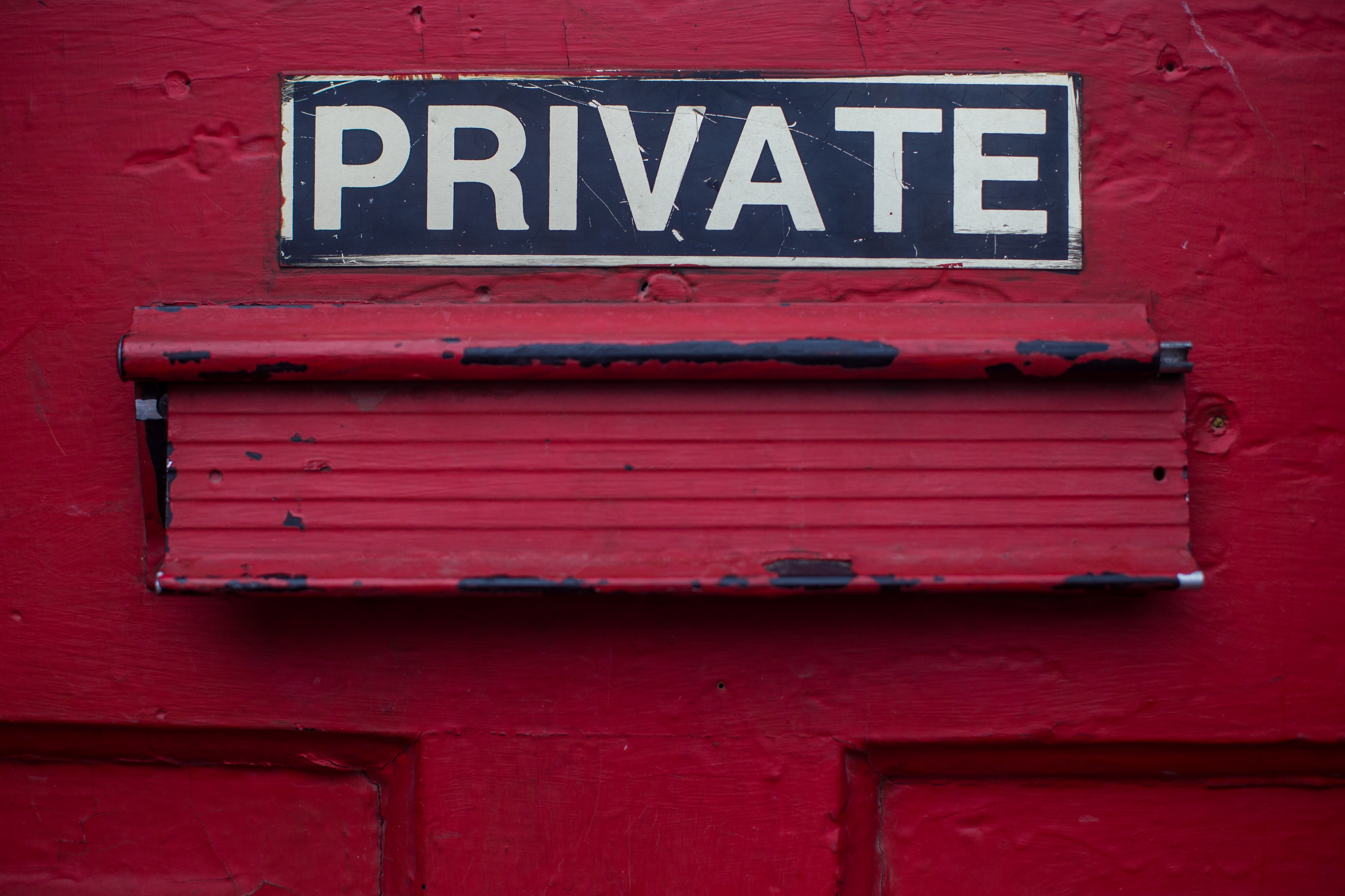 text private written on red wall